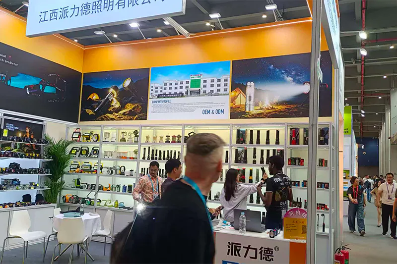 PLD LED China Import and Export Fair (Canton Fair) 2026 booth aisle with OEM and ODM product wall